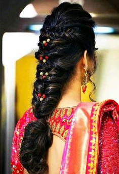 a woman with long hair in a braid