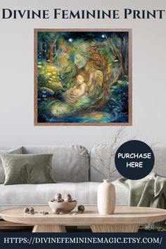 a living room with a couch, table and painting on the wall above it that reads divine feminine print purchase here