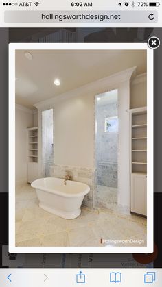 a white bath tub sitting inside of a bathroom