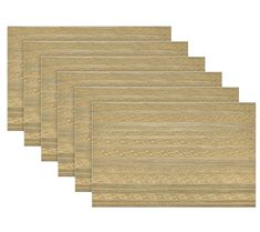 six pieces of wood are lined up on a white background