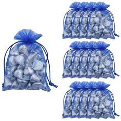 four bags filled with silver colored chocolate eggs