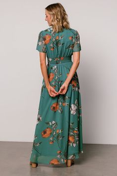 This gorgeous deep cinnamon colored maxi gown is perfect for all seasons! The beautiful flow of the material and deep V neckline will have you feeling whimsical. Modest V-neck Dress With Elastic Waistband, Flowy Chiffon Maxi Dress With Short Sleeves, Flowy V-neck Chiffon Dress, Green V-neck Maxi Dress With Smocked Back, Flowy Chiffon Dress With Floral Print And Short Sleeves, Flowy Chiffon Maxi Dress With V-neck, Flowy Chiffon V-neck Maxi Dress, Flowy V-neck Chiffon Maxi Dress, Spring V-neck Flowy Chiffon Dress