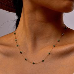 Elevate your jewelry collection with our exquisite Dual-Color 18K Gold-Plated Crystal Bead Necklace. This elegant piece features a stunning combination of vibrant emerald and deep black crystals, interspersed with gleaming gold beads. Choose between the lush greens of emerald or the bold allure of black for a versatile accessory that adds a touch of luxury to any look. Key Features: - 18K Gold Plating: Each necklace is meticulously plated with 18K gold for a rich, long-lasting shine. - Premium Crystals: Hand-selected emerald and black crystals ensure maximum sparkle and clarity. - Interspersed Design: Gold beads are strategically placed between crystal beads for a visually striking effect. - Versatile Choice: Perfect for both formal events and everyday wear, this necklace is a timeless add Gold Emerald Bead Necklaces, Gold Emerald Round Bead Necklaces, Green Jewelry With Beaded Chain, Elegant Emerald Necklace With Beaded Chain For Gifts, Elegant Gold Emerald Necklace With Polished Beads, Elegant Emerald Necklace With Beaded Chain, Beaded Emerald Jewelry For May Birthstone, Gold Beaded Emerald Necklace, Elegant Beaded Emerald Necklaces