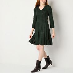 This Jessica Howard women's sweater dress features a classic cable-knit in a rich green hue that's perfect for the colder months. This short dress has a v-neckline, a subtle fit and flare silhouette and 3/4 sleeves. Wear it with ankle boots and your favorite earrings. Closure Type: Pullover HeadNeckline: V NeckSleeve Length: 3/4 SleeveSleeve Style: Fitted SleeveApparel Length: 35.5 Inches - BackDress Length: Knee LengthFiber Content: 100% AcrylicFabric Description: KnitCare: Machine Wash, Dry Fl Petite Sweater Dress, Sweater Dress Petite, Large Dresses, Medium Dresses, Dress Sweater, Jessica Howard, Sweater Dresses, Rich Green, Sweater Dress Women