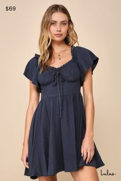 Let your precious side show off in the Lulus Adorable Personality Navy Blue Linen Off-the-Shoulder Mini Dress! This sweet dress has a lightweight, woven linen-blend fabrication that shapes a ruffle-trimmed, elasticized off-the-shoulder neckline that flows into fluttery short sleeves. Fitted bodice features seamed cups and a decorative tying detail at the center. High waist sits atop a skater skirt that finishes at a cute mini hem. Hidden side zipper. Fit: This garment fits true to size. Length: Chic Blue Linen Mini Dress, Knot Tie Dress, Side Show, Navy Blue Linen, Mini Skater Dress, Mini Dress Casual, Sweet Dress, Tie Dress, Fitted Bodice