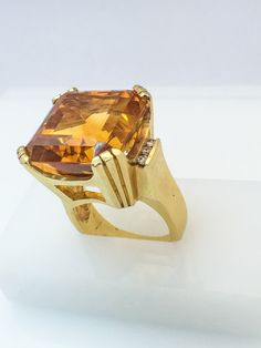 Birmingham Jewelry Fashion Ring with a Beautiful Citrine gemstone 14K Yellow Gold Citrine: 25.73ct Diamond: 6 round stones 0.15tw Size: 7.00 Citrine Jewelry 1stdibs, Modern Luxury Yellow Gold Topaz Ring, Gold Rings Fashion, Ancient Jewelry, Citrine Ring, Citrine Gemstone, Fashion Ring, Gold Fashion, Pandora Jewelry