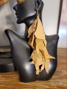 Genuine leather tanish gold cascading earrings. Available in different lengths Cascading Earrings, Earrings Fabric, Patchwork Boots, Leather Necklaces, Denim Earrings, Big Statement Earrings, Denim Clutch, Jewelry Making Business, Denim Jewelry