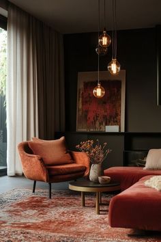 a living room filled with furniture next to a large glass window and a painting on the wall