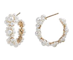 With their classic materials and feminine, modern design, these Sophie Bille Brahe earrings are a striking combination of the traditional pearl with the traditional hoop. The 14K yellow gold hoop is lined with luminous white freshwater pearls set in tiny, tapering flowers. Elegant, yet bold, they can be worn with everything from casual to formal. total length : 1"width : 1/4" to 3/8"freshwater pearls : vary : 2mm diameter to 5mm diameter each14K yellow gold post back Small Hoop Earrings With Pearl Drop For Formal Occasions, White Hoop Pearl Earrings For Formal Events, White Hoop Pearl Earrings For Formal Occasions, Wedding Pearl Hoop Earrings In Fine Jewelry Style, Wedding Hoop Pearl Earrings Fine Jewelry, Yellow Gold Pearl Hoop Earrings For Wedding, Wedding Fine Jewelry Pearl Hoop Earrings, Luxury Pearl Hoop Earrings For Formal Occasions, Yellow Gold Hoop Pearl Earrings For Wedding