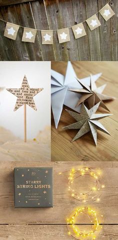 christmas lights and paper stars on a wooden table next to a card with the words shine in it