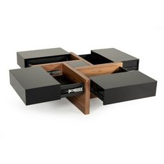 three black and wood drawers with one drawer open