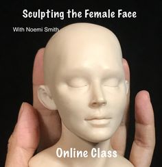 a person holding a white mannequin head with the words sculpting the female face