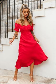 Red midi dress.Partially lined.Off-shoulder style.Ruched bodice.Elasticated puff sleeves.Tie at back.Zipper in back. Stop what you are doing because this dress deserves a moment. Jaws will drop when you strut by in our adorable Linka midi dress. Featuring an off-shoulder style and the cutest puff sleeves, we're head over heels! Perfect for a girls' night out paired with strappy heels and statement earrings. Hello, gorgeous! MODEL INFOModel is wearing size XSHeight: 5’6”Bust: 33”Waist: Red Midi, Off Shoulder Fashion, Ruched Bodice, Clothing Tags, Date Night Dresses, Head Over Heels, Red Midi Dress, Mini Dress Casual, Hello Gorgeous