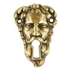 a golden door handle with an image of a man's face on the front