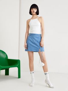 MO&Co.Women Cutout Waist Cotton Skirt Features : - High-rise - A-line hem - Split-cut design - Rear metal zipCode : MBB2SKT026Length of size M is 40.5cmBlue : Model is 175cm tall and wearing a size M MATERIALS & CARE : Material : 100% CottonUse a washing machine at mild process of 30â„?br> Do not bleach Iron at low temperature Do not tumble dry Tips : It is a normal phenomenon that denim products have slight discoloration.Please select your own size in the size chart according to your figure and Cotton Skirt, Denim Mini Skirt, Cut Design, Tumble Dryer, Size Chart, Blue Color, Blue, How To Wear