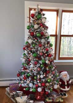 a decorated christmas tree in a living room