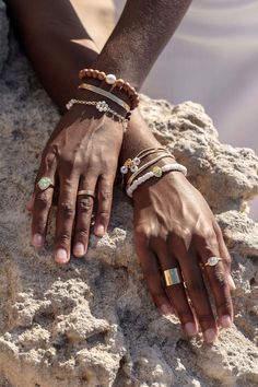 A perfect stacking bracelet. This stretchy bracelet features fragrant wooden beads carved from sandalwood, delicate gold-filled accents, and a single white freshwater pearl for good measure. Bonus: easy on and off because it's stretchy!✦ DETAILS ✦✧ Name: Kamaha'o (KA ma HA oh) - Wonderful, astonishing, remarkable.✧ Choose your size: X-Small, Small, Medium, or Large.✧ Genuine White Freshwater Pearl.✧ 8mm Fragrant Sandalwood Beads✧ 14kt Gold Filled Components - no clasp✧ All Ke Aloha Jewelry piece Everyday Gold Stretch Bracelet With Wooden Beads, Sandalwood Bracelet, Hawaii Jewelry, Chunky Bracelets, Pearl Collection, White Freshwater Pearl, Stretchy Bracelets, Beach Jewelry, Bracelet Stack