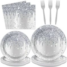 a set of silver glitter party plates and napkins