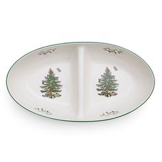 two plates with christmas trees on them, one is white and the other has green trim