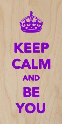 a wooden plaque with the words keep calm and be you written on it in purple