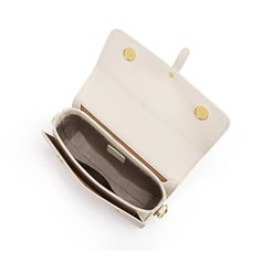 Discover Elegance and Versatility Step into the season with sophistication using our exclusive White Leather Crossbody & Shoulder Bag. Designed for the fashion-forward woman, this bag embodies elegance and versatility, perfectly complementing your spring and summer wardrobe. Whether you're attending a daytime event or an evening soiree, this bag seamlessly adapts to all occasions, ensuring you always step out in style. Premium Quality and Design Crafted with genuine cow leather, this bag boasts a soft, luxurious texture that's both durable and stylish. The saddle shape design, combined with a solid pattern and a flap pocket exterior, offers a classic yet contemporary look. Its multiple interior compartments, including a slot pocket, zipper pocket, and a spacious main compartment, provide a Elegant Travel Baguette Bag With Adjustable Strap, Chic Top Handle Baguette Bag For Travel, Elegant Baguette Bag With Adjustable Strap For Travel, Elegant Shoulder Bag With Adjustable Strap For Travel, Chic Flap Bag With Removable Pouch For Travel, Elegant Satchel Shoulder Bag For Travel, Elegant Spring Shoulder Evening Bag, Elegant Crossbody Flap Bag For Travel, Elegant Crossbody Satchel With Removable Pouch