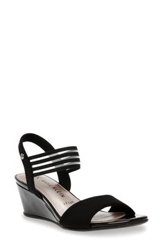 An ankle strap adds sporty style to this open-toe wedge sandal that is perfect for a day in the sun. 58mm heel Open toe Striped strap detail Slip-on Wedge heel Textile and synthetic upper/synthetic lining and sole Imported Medium Width Wedge Sandals With 4-inch Heel, Black Wedge Sandals For Evening, Medium Width, Black Trendy Wedge Sandals With 4-inch Heel, Black Pointed Toe Wedge Sandals With 4-inch Heel, Black Wedge Sandals With 4-inch Heel And Pointed Toe, Wedge Sandal, Sandal Women, Summer Ready, Anne Klein