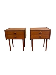 two small wooden tables with drawers on each side