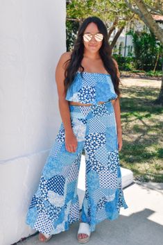 Add some fun to your vacation wardrobe with the Cabo Coast Two Piece Set. The stunning blue color will make you stand out in photos, while the stretchy and flowy fabric keeps you comfortable all day long. Perfect for lounging on a resort or exploring the city.
Stretchy all around the chest and waist 
Slit on the side of the pants
Sold as a set
FIT: True to size. Model is a size 8, and 5'7" wearing a size medium. 
SMALL: 0-4, MEDIUM: 6-8, LARGE: 10-12 One Piece & Sets, Vacation Wardrobe, Flowy Fabric, Summer Outfits Women