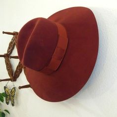 Autumn Merlot Colored Fedora Is Perfect For Fall/Winter Season. A Wide Brim & Fedora Style Is Sure To Compliment Your Outfit. Measurements: 6" 3/4 Circumference Around Brim 47" Fabric: 100% Soft Wool Felt Vintage Red Fedora With Curved Brim, Burgundy Winter Fedora With Short Brim, Vintage Red Hat For Fall, Burgundy Short Brim Fedora For Winter, Red Winter Fedora With Short Brim, Red Fedora With Short Brim For Winter, Classic Red Felt Hat For Fall, Red Short Brim Fedora For Winter, Winter Burgundy Wide Brim Fedora