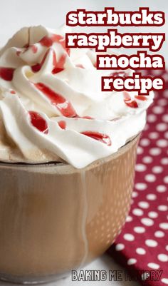 a close up of a drink with whipped cream on top and the words starbucks's raspberry mocha recipe