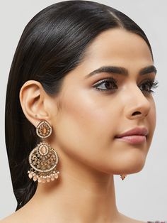 NAZRANAA JEWELS OFFERS A GREAT RANGE OF INDIAN JEWELRY FOR TODAY'S WOMAN WITH THE LATEST DESIGNS. THE BRAND IS COMMITTED TO PROVIDING ITS CUSTOMERS WITH THE HIGHEST QUALITY OF GOODS AND NEWEST DESIGNS. IT IS SUITED FOR A WOMAN WHO IS LOOKING TO STAY DATED WITH THE LATEST TRENDS. RADIANT ANTIQUE GOLD EARRINGS IN DIFFERENT COLOR PEARLS IS A PERFECT ACCESSORY FOR ANY NIGHT EVENT. IT IS SURE TO MAKE YOU STAND OUT IN A CROWDED ROOM. Traditional Indian Jewelry: Slight Color variations possible due to Golden Indian Earrings, Rose Gold Earrings For Wedding And Festive Occasions, Festive Rose Gold Earrings For Gift, Rose Gold Danglers For Wedding, Rose Gold Drop Earrings For Festive Occasions, Gold Teardrop Danglers For Wedding, Bollywood Style Gold Ceremonial Earrings, Rose Gold Chandbali Jewelry For Wedding, Heavy Bollywood Style Gold Plated Earrings