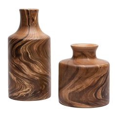 two wooden vases sitting next to each other