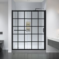 a modern bathroom with black and white accents