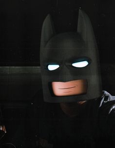 a batman mask with glowing blue eyes is shown in the dark knight movie, it appears to be lit up