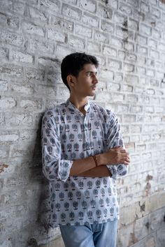 This is a Handblock printed shirt for men made in cotton Traditional Relaxed Fit Cotton Shirt, Cotton Ikat Print Long Sleeve Top, Long Sleeve Cotton Top With Ikat Print, Casual Cotton Shirt With Printed Motifs, White Cotton Relaxed Fit Kurta, Traditional Fit Cotton Long Sleeve Tops, White Cotton Kurta With Relaxed Fit, White Relaxed Fit Cotton Kurta, Traditional Fit Long Sleeve Cotton Top