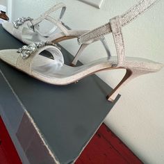 Beautiful Ann Taylor Ivory Silver Skinny Strap Heels. Brand New Never Worn. Elegant Synthetic Almond Toe Wedding Shoes, Elegant Synthetic Wedding Shoes With Almond Toe, Elegant Cream Synthetic Sandals, Elegant Cream Synthetic Heels, Cream Synthetic Heels For Formal Occasions, Formal Cream Synthetic Heels, Crystal Shoes, Shoes Color, Strap Heels