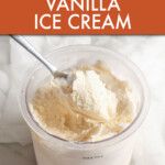 vanilla ice cream in a plastic cup with a spoon on the side and an orange sign that says vanilla ice cream