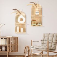 a living room filled with furniture and decor on top of hard wood flooring next to a white wall