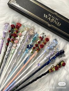 six different types of wands in a box