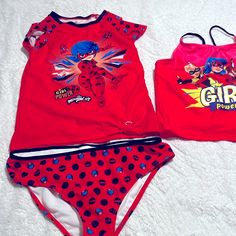 Miraculously Lady Bug 3 Piece Bathing Suit Condition- Gently Used. 3 Piece Bathing Suit Girls Size 14-16 Was Only Used Once, Has Been Washed And Sanitized. This Is From A Non Smoke Home. Playful Fitted Sets With Character Print, Playful Multicolor Swimming Sets, Cute Red Swimwear For Playtime, Playful Red Fitted Sets, Playful Red Fitted Set, Playful Black Sets With Character Print, Playful Fitted Red Sets, Fitted Red Playwear Sets, 3 Piece Bathing Suit