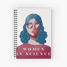 a spiral notebook with the words women in science written on it and an image of a woman wearing sunglasses