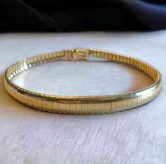 "Beautiful 14k Italian Yellow Gold Graduated OMEGA 7.25\" Vintage Bracelet! A very beautiful Omega bracelet! In excellent vintage condition! * Expertly crafted in solid 14k (585) yellow gold * Graduated width from approximately 3mm width to 6mm * Measures approximately 7.25\" * Secure box closure * Hallmarked 14k * Weighs 9.6 grams Shipped FAST and FREE, in a gift box fully insured :) I guarantee item to be exactly as described and pictured." Omega Bracelet, Real Gold Bracelet, Flat Bracelet, Seed Pearl Ring, Flexible Bracelet, Gold Apple, Gold Bracelet For Women, Vintage Bracelet, Black Gift Boxes