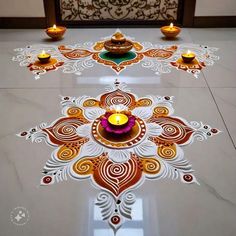 a decorated floor with candles on it