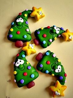 decorated cookies arranged in the shape of christmas trees