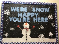 a bulletin board with a snowman on it that says, we're snow happy you're here