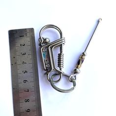 Handmade keychain stely Keychain Hook, Teaching Videos, Buddha Head, Earplugs, Handmade Brass