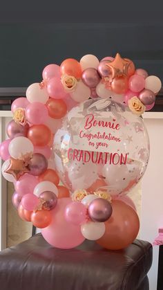 a balloon arch that says bonnie congratulations for her graduation