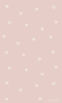 a pink background with white hearts on it