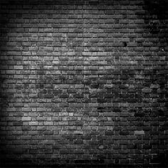 black and white brick wall with light coming from it stock photo - 557982