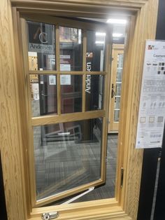 an open wooden window on display in a store